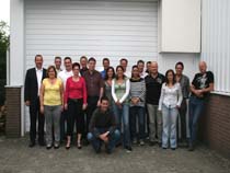 De collega's van Varel op de foto